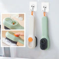 Soap-Dispensing Cleaning Brush